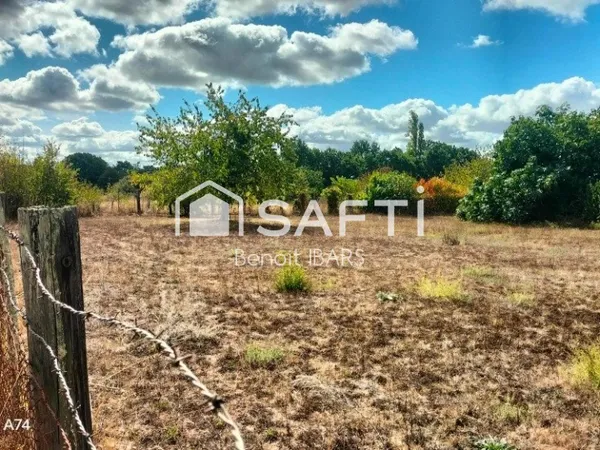 Un terrain clos non constructible, de loisir avec eau de la ville puits et arbres
