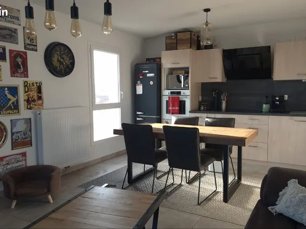 Appartement 60m2 terrasse et 2 places de parking en sous-sol
