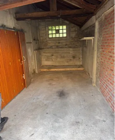 Garage avec parking et jardin
