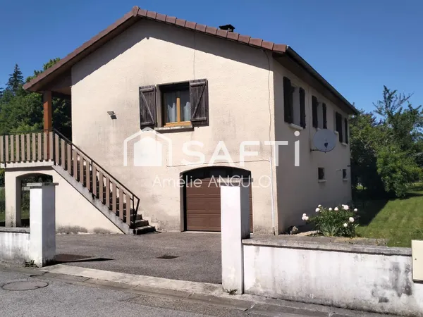 Maison familiale de 5 pièces avec grand garage et terrain arboré
