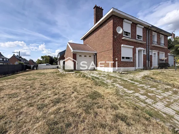 Type bâtir avec 3 chambres, garage et jardin