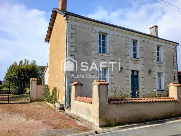 Grande maison familiale avec un jardin clos et arboré