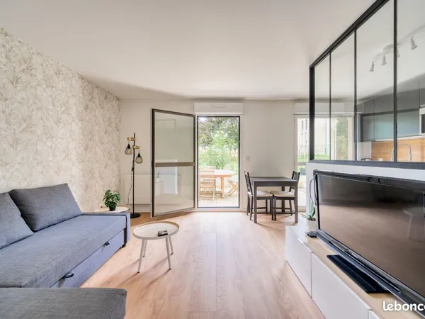 À louer appartement 2 pièces 50 m2 avec Terra 50 m2 et Parking