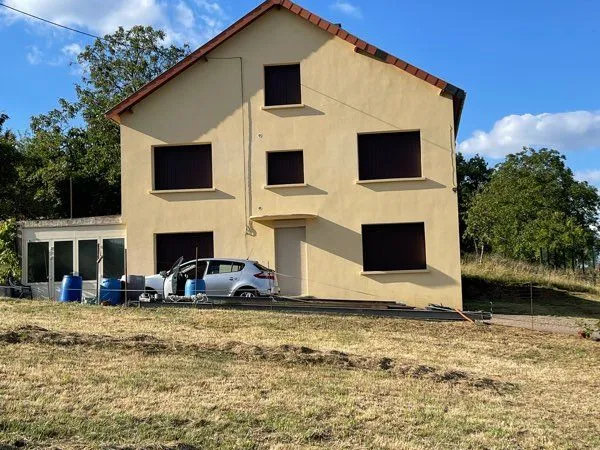Maison + corps de ferme + terrains