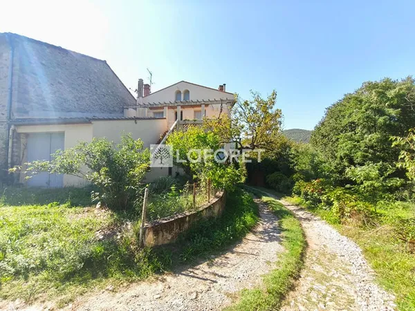 Maison à Reynes avec 2 logements, dépendances et grand terrain