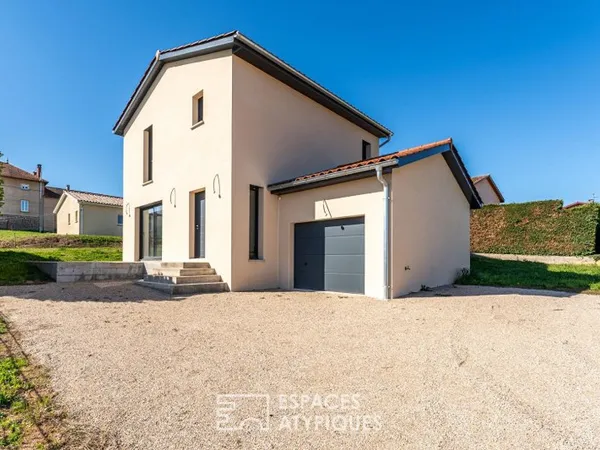 Maison neuve avec jardin et garage