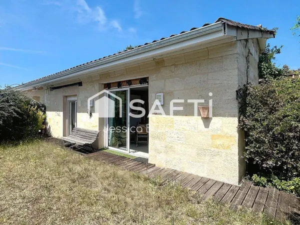 Maison avec dépendance au calme entouré de verdure