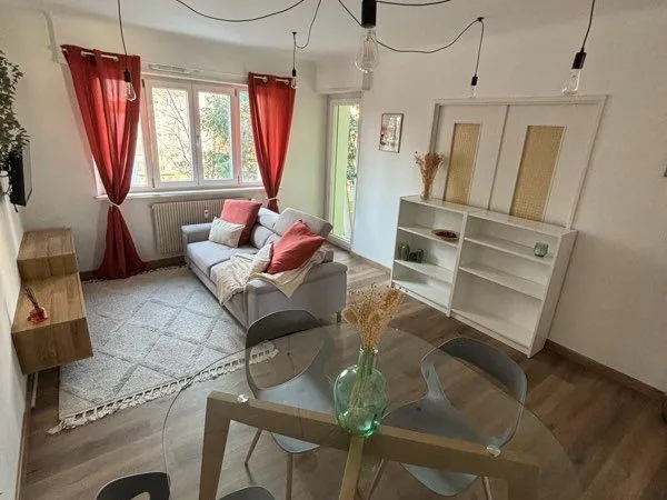Appartement 4 pièces 70 m², dernier étage, balcon, terrasse, garage et 2 caves