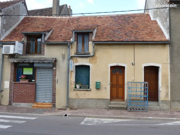 Immeuble (local commercial et appartement)