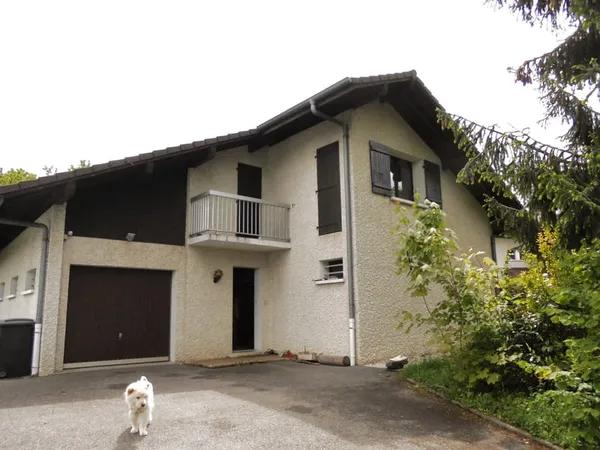 Maison 4 chambres garage et jardin.
