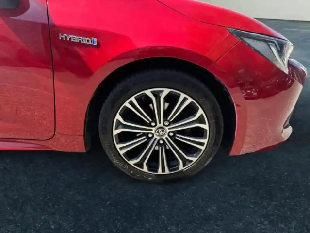 Toyota Corolla 122h design — photo 11