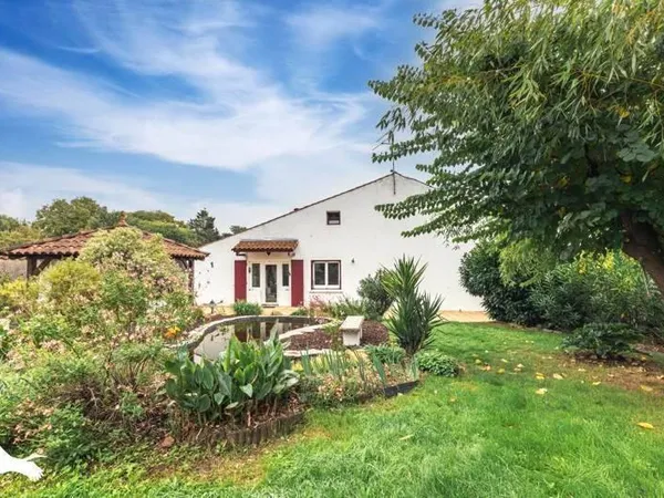 Maison 7 pièces 215 m²
