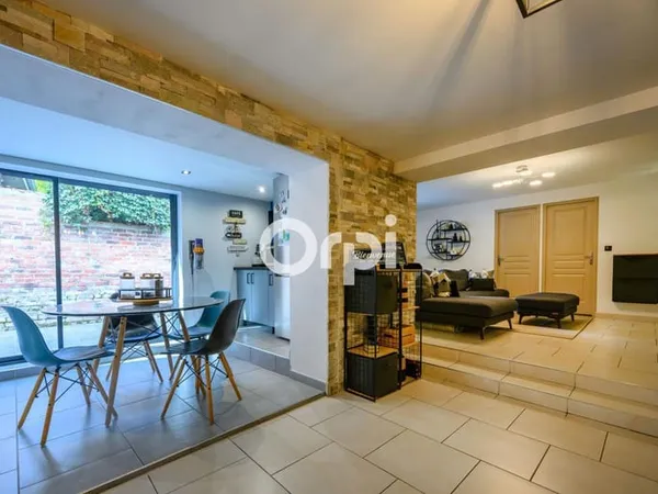 Ensemble immobilier à fort potentiel — 3 logements + grand terrain de 1 400 m²