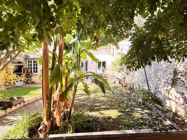 Maison T6 avec garage et jardin