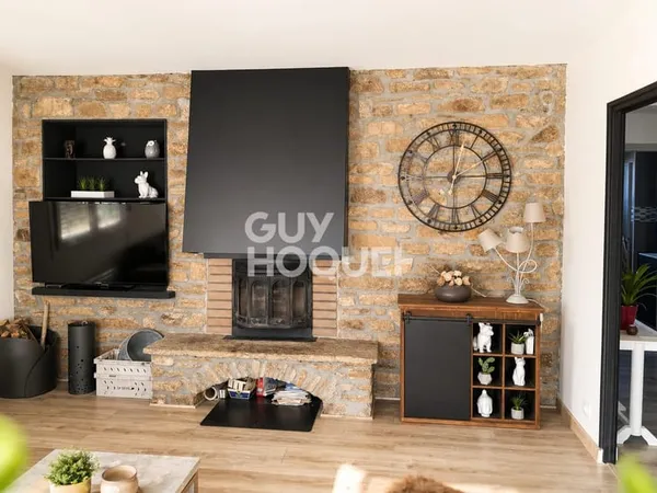 T4 entièrement rénové de 98 m² avec jardin, garage et stationnement