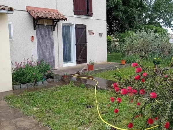 Maison T6 avec jardin paysagé et garage