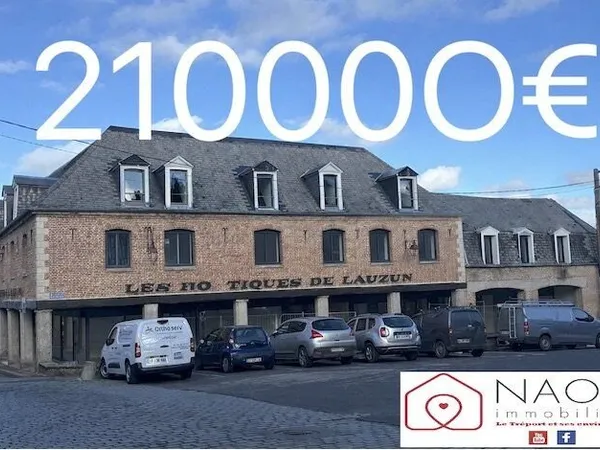 Appartement à vendre au Lauzun proche des commerces au 1 ère Étage avec ascenseur, box , place de pa