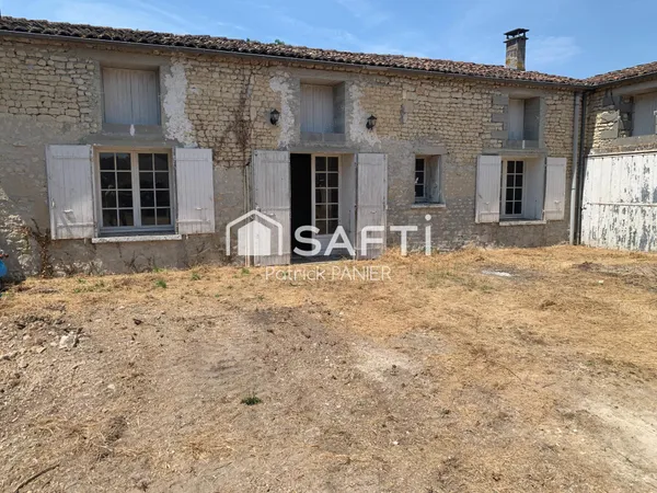Maison individuelle de caractère avec jardin, garage et dépendance !