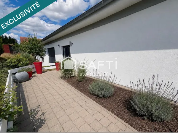 Maison de plain pied avec 2 terrains à batir viabilisés
