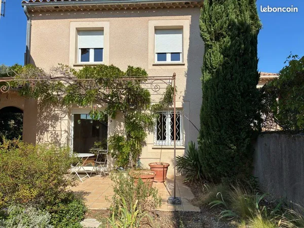 Maison avec jardin et garage