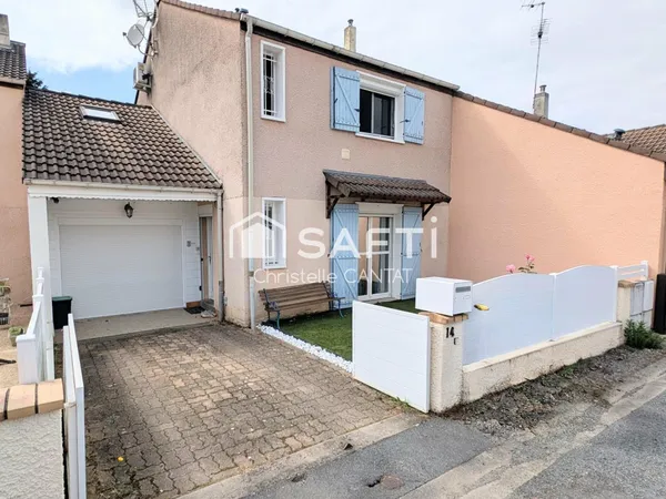 Maison 3 chambres, terrain et garage.