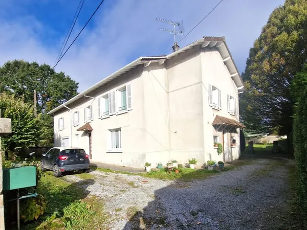 Bien composé de 2 logements et d'une parcelle constructible