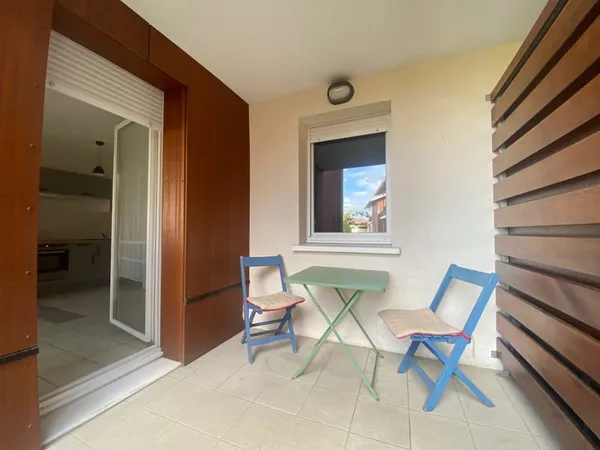 APPARTEMENT de TYPE 2 avec balcon et parking couvert