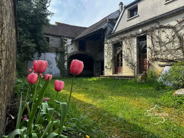 Une maison de caractère au coeur d'un environnement recherché
