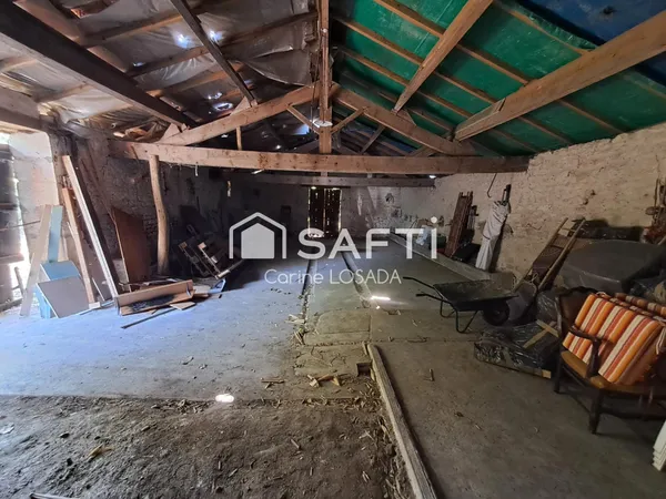Terrain constructible avec bâti d'environ 100m²