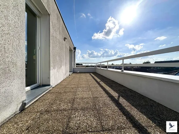 T2 - 2 balcons- place de parking- cave