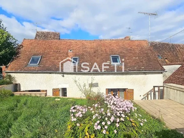 Maison avec 2 chambres, jardin attenant et garage