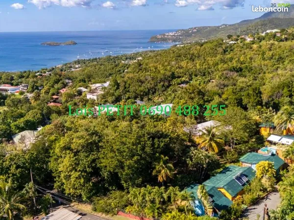 Maison familiale avec 4 gîtes et piscine | Vue mer à Bouillante