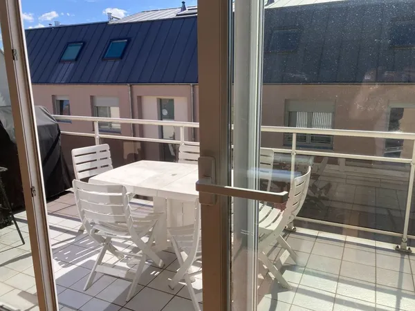 Duplex de 92m2, double garage et place de parking