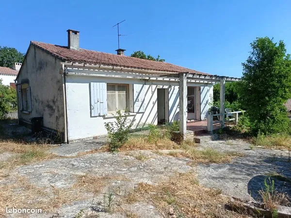 Terrain avec maison