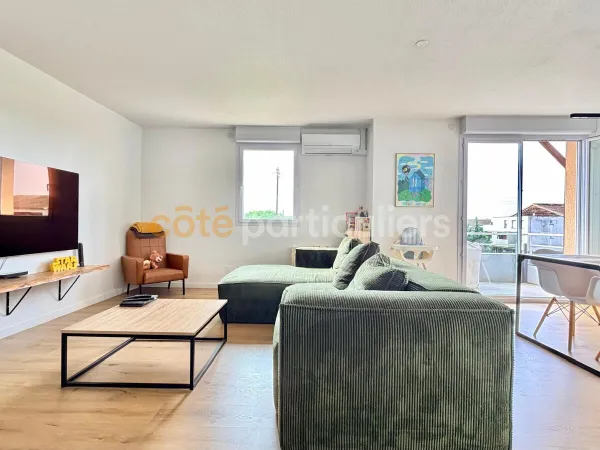 Appartement T4 avec balcon et 2 places de parking