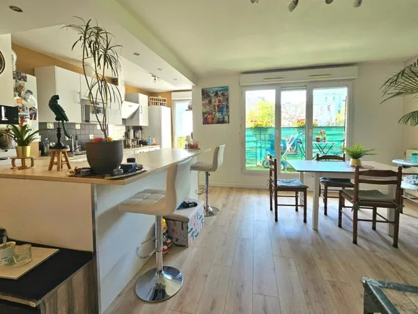Appartement 3 pièces dans une résidence de standing avec jardin.