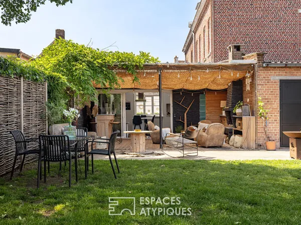 Maison de famille aux volumes pluriels avec jardin