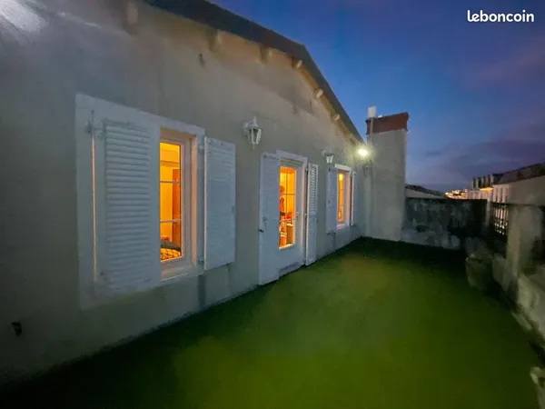 Comme une maison sur le toit