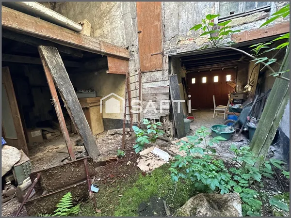 2 garages à rénover en centre ville.