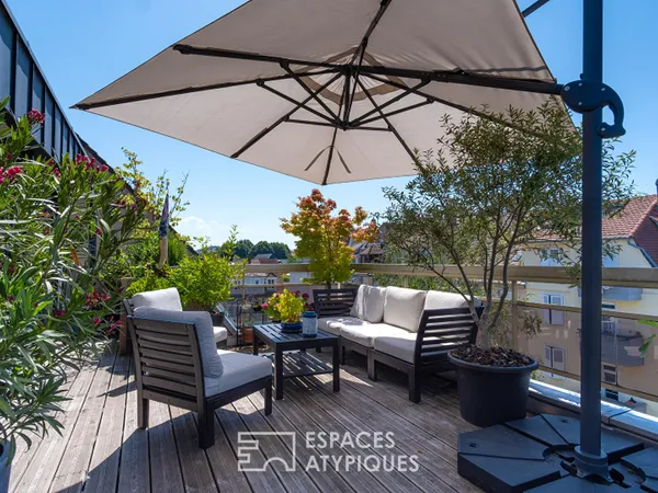 Appartement contemporain en dernier étage avec terrasse au coeur de Neudorf