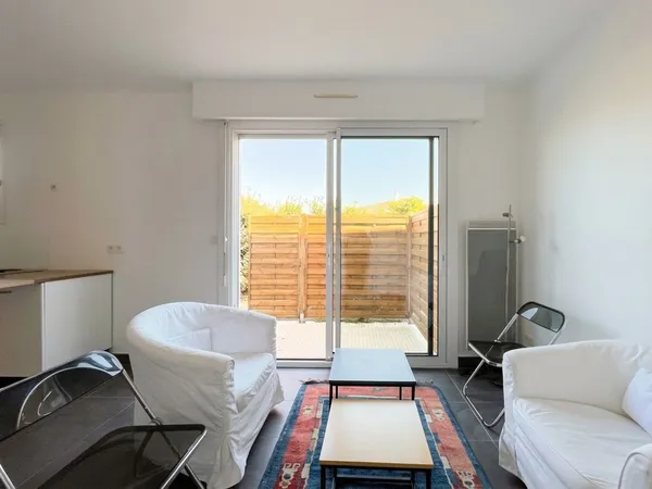 T4 57,43 m² - RDC - Terrasses et jardinet