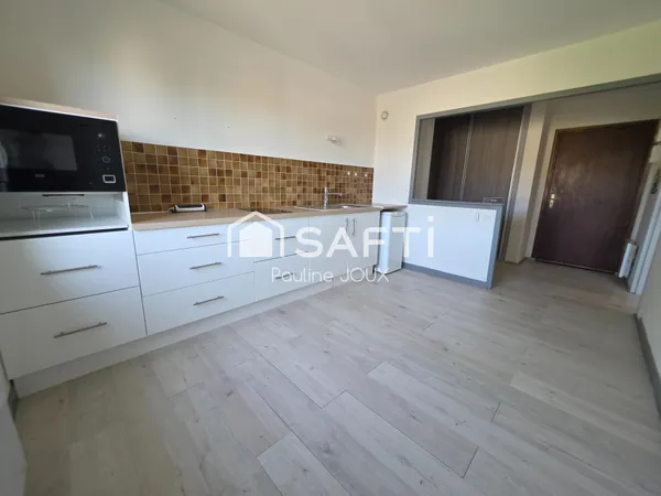 Appartement type F2 avec balcon, garage, cave et grenier