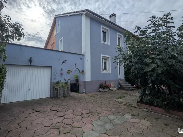 Maison 4 pièces avec garage et petit jardin