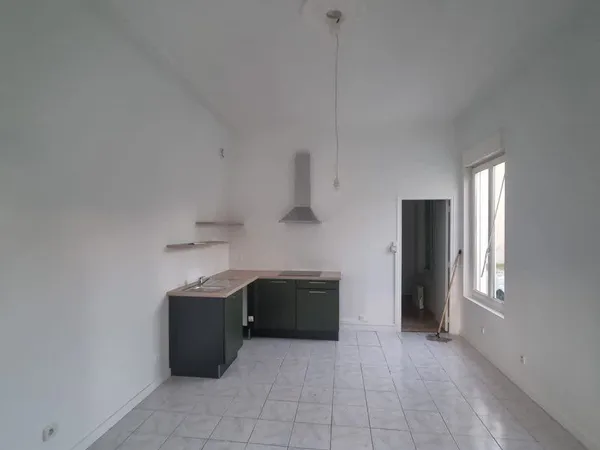 Appartement avec jardin et place de stationnement