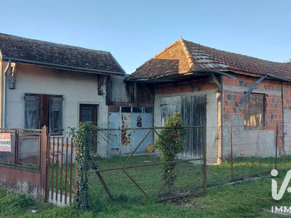 Cède ancien atelier à rénover+ garage à Montaulin