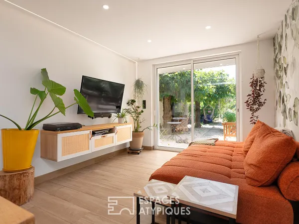 Élégante maison rénovée avec garage et grand jardin