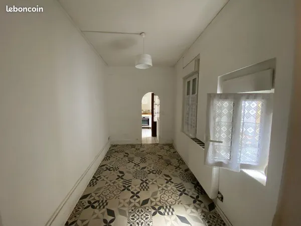 Appartement T3 de 53 m² à vendre - Centre-ville au calme - Jardin privatif avec vue sur les remparts