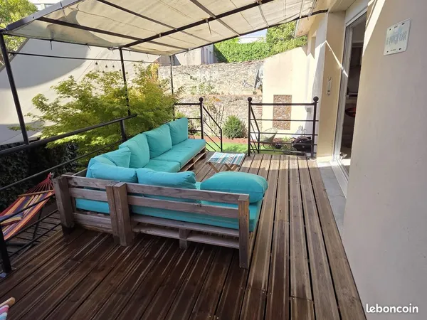 En coeur de ville, bel ensemble comprenant 4 chambres, jardin et garage