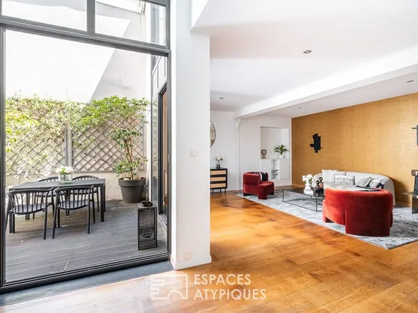 Loft à la rénovation contemporaine au calme avec patio privatif