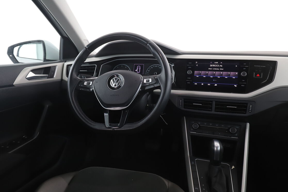 Volkswagen Polo 1.0 TSI Carat DSG7 — photo 12